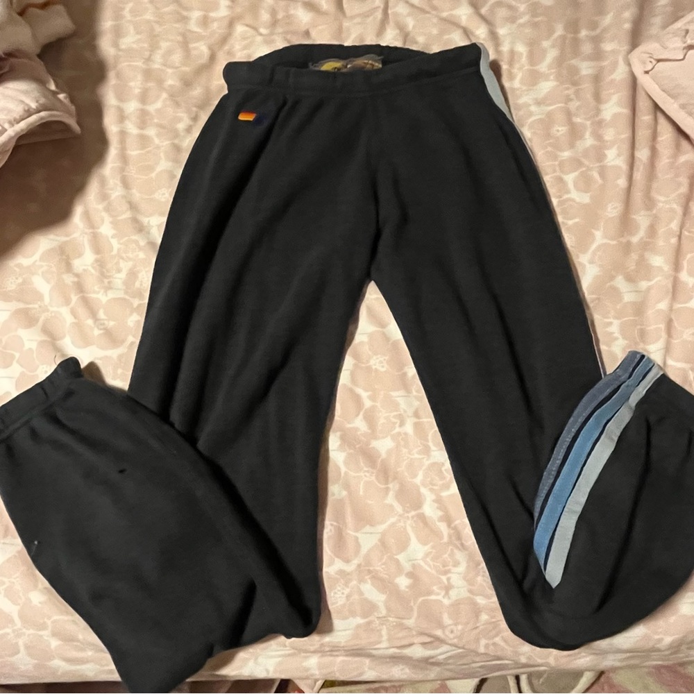 selling black sweatpants with blue stripes they are super trendy and preppy!!!!!